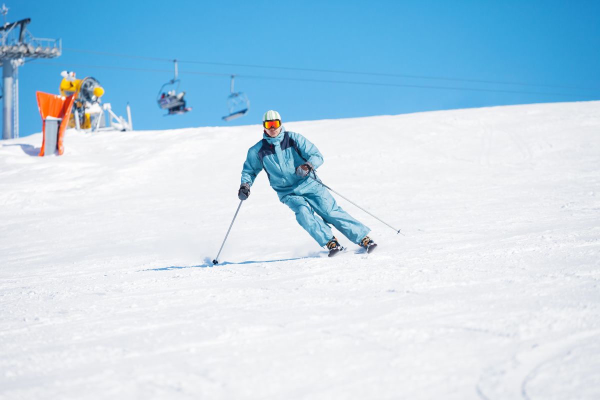 Snow skiing carving at high speed.