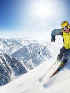 Skier with hard ski jacket.