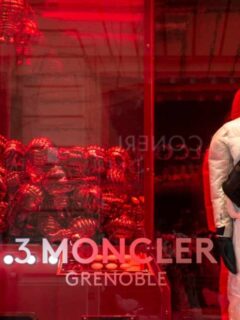 Winter ware, ski jacket, bag and accessories in a Moncler fashion boutique window.